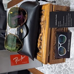 NEW Goldtone Aviator polarized Grey polycarbonate with mirrored coating.